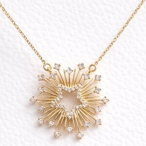 Gold Starburst Necklace with Crystal Accents